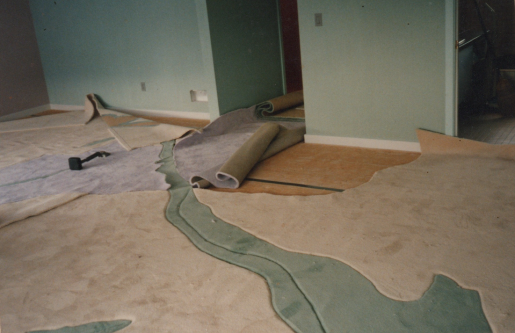 Carpet installation in progress by American Flooring Specialists in Albany, NY.