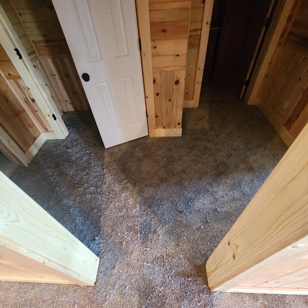 Carpet installation in progress in a room by IDF The Floor Store in Idaho Falls, ID.