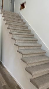 Newly installed carpet on a staircase by S&K Flooring Solutions in Augusta, GA