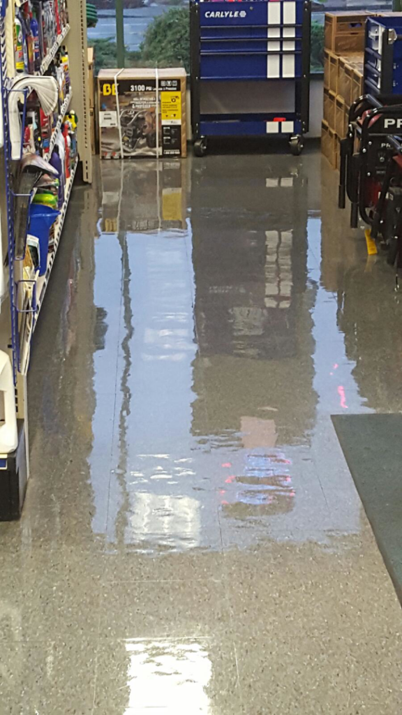 A professional installing or repairing carpet for Floors N More Cleaning Inc. in Vancouver, WA.