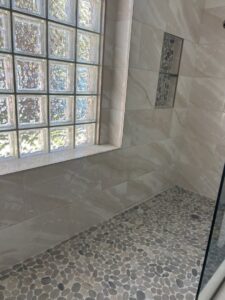 Carpet installation tools on newly laid patterned carpet by Bentley Carpet Installation & Sales in Phoenix, AZ.