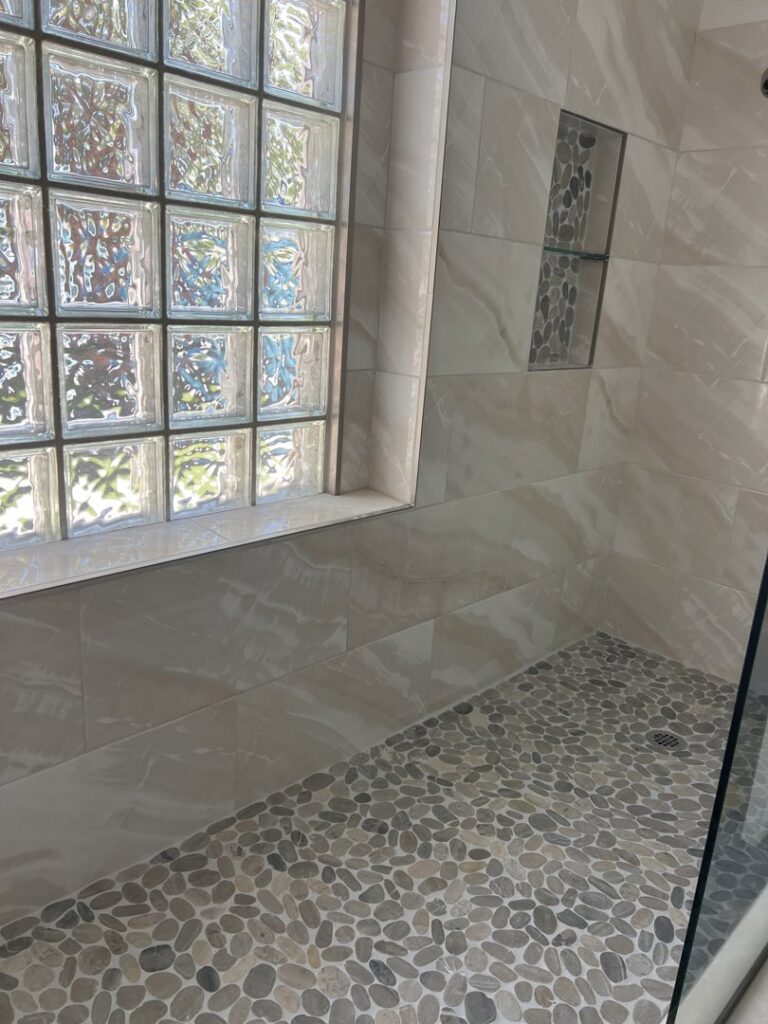 Carpet installation tools on newly laid patterned carpet by Bentley Carpet Installation & Sales in Phoenix, AZ.