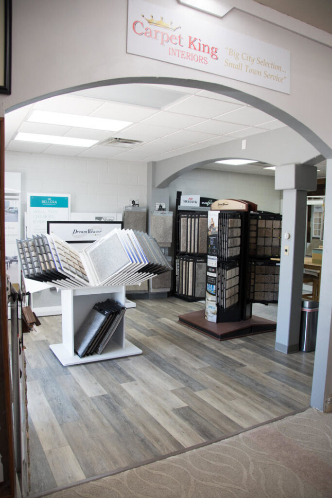 An interior view of the Carpet King Interiors / Abbey Carpet & Floor showroom, showcasing various flooring and carpet displays in Fernley, NV.