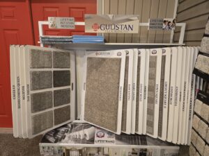 A wide selection of carpet options displayed in the Big Red Flooring showroom in Omaha, NE