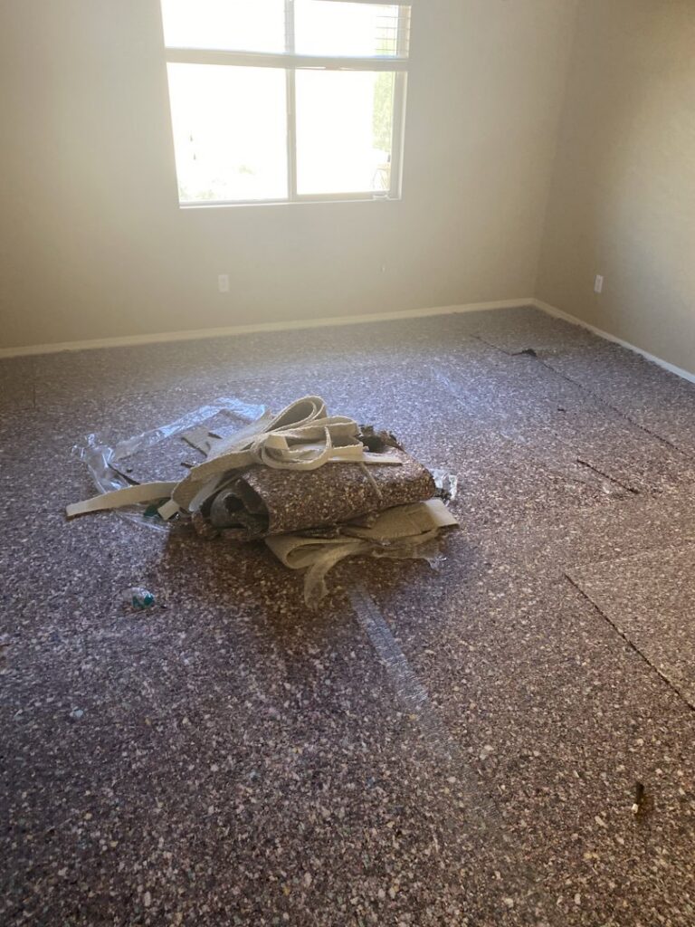 A room with new carpet padding installed, ready for carpet installation by Mark Hart Flooring Consultant at RM Interiors & Design in Mesa, AZ.
