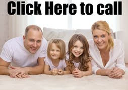 Carpet pulled back revealing padding and tack strip during a carpet installation or repair job by Pro-Steam Carpet Cleaning, LLC in Colorado Springs, CO.