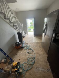 Flooring tools and a staircase with carpet, indicating carpet removal or installation work by A-1 Floors in Fairfield, CA.
