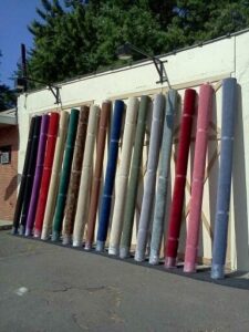 Various colorful carpet rolls available for selection and installation at Carpet Ends in West Springfield, MA.