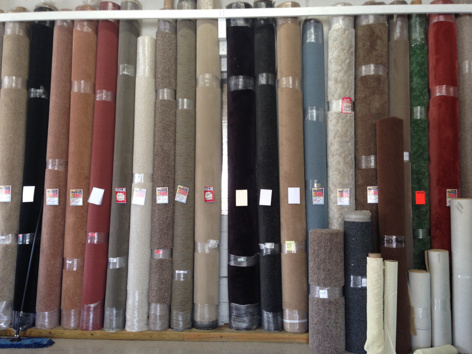 A wide selection of carpet rolls displayed in the showroom at The Floor Store Inc. in Scranton, PA.