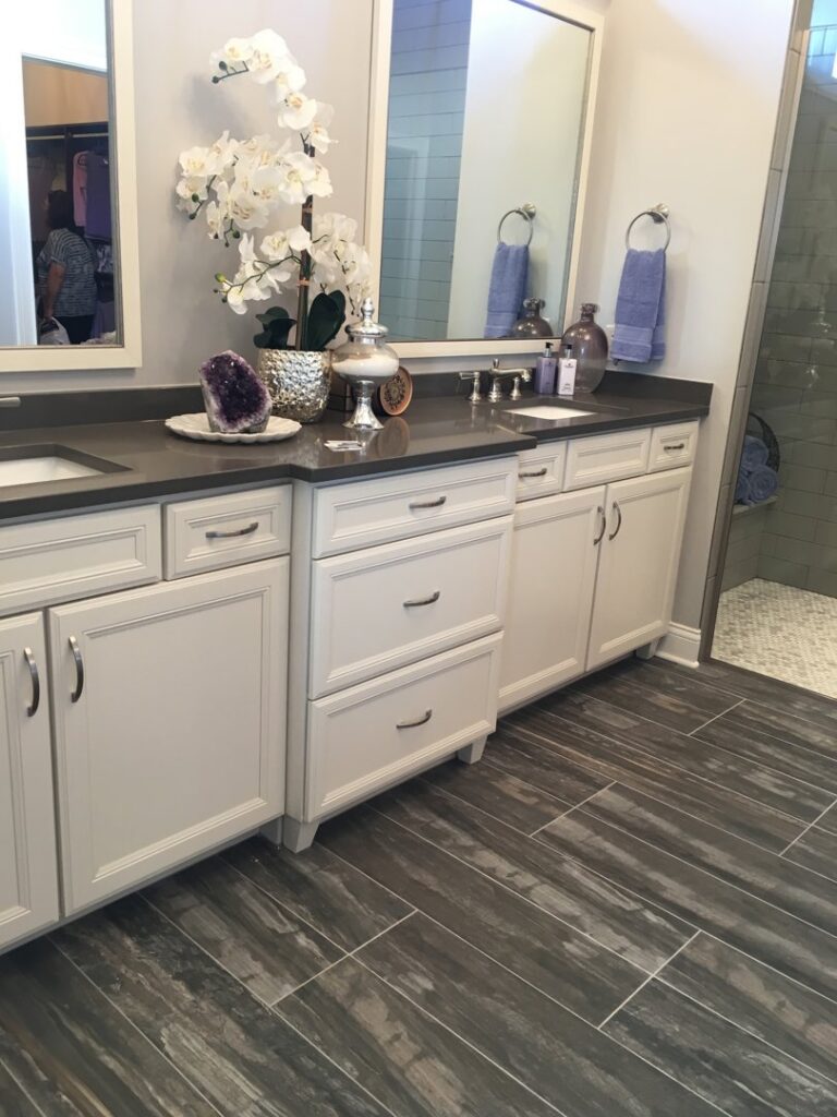 A beautifully installed carpet runner on a modern staircase by Custom Floors in Fishers, IN