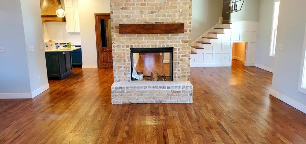 A newly installed black and white patterned carpet runner on a staircase by The Wood Floor Company in San Jose, CA