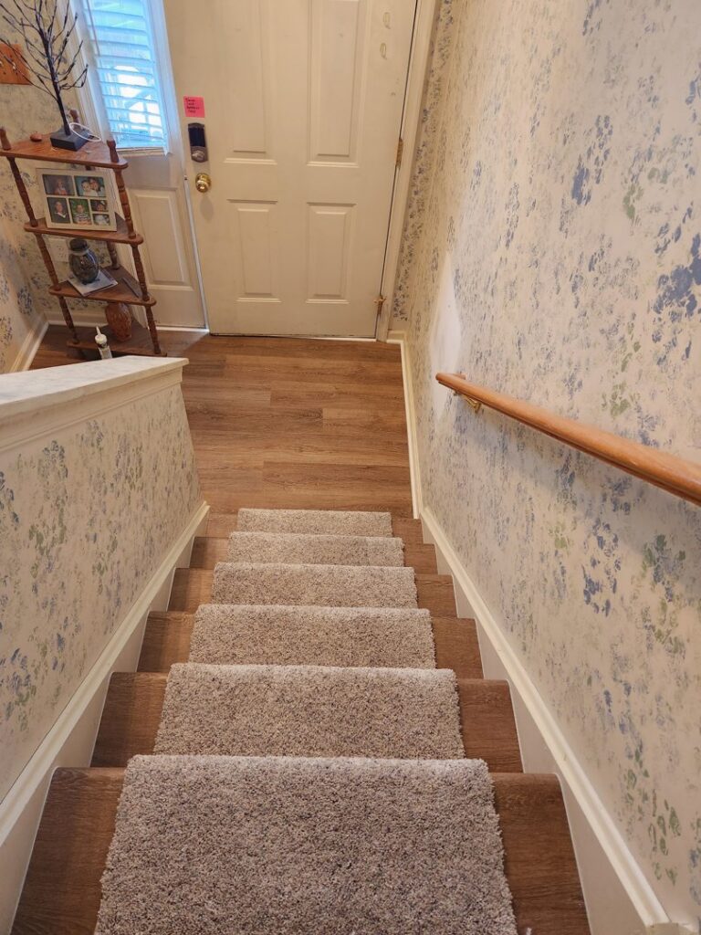 Stairs with a newly installed carpet runner by Jordan's Flooring in Martinsburg, WV