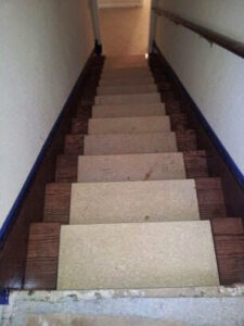 Carpet runners installed over a wooden staircase by Delgado Carpet Services in San Jose, CA