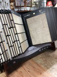 A display rack showcasing various carpet samples at Keystone Floor Works in Philadelphia, PA