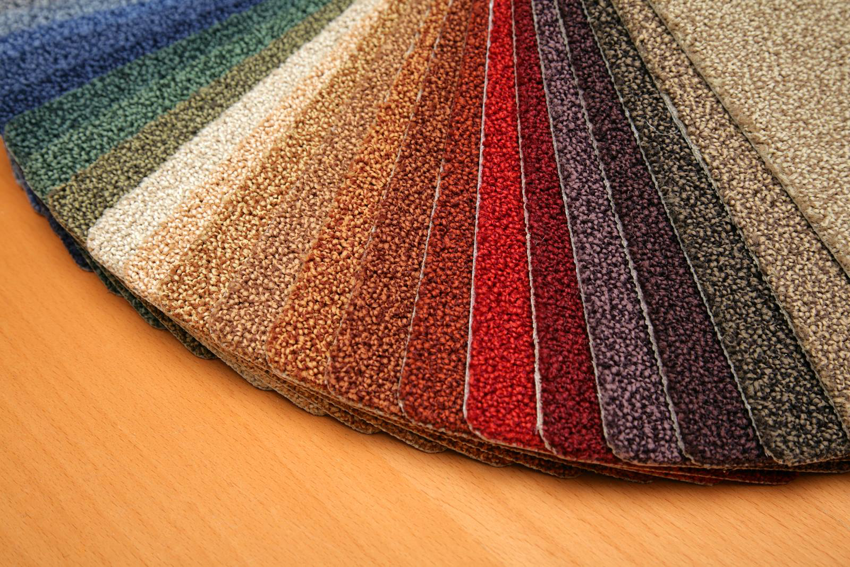A fan of colorful carpet samples and swatches for selection at Eatherton's Fashion Floors in St. Louis, MO.