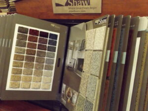 A display of various carpet samples and swatches for selection at 1 in ALL GC in Virginia Beach, VA.