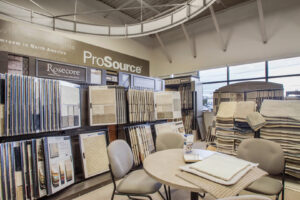 Rows of various carpet samples displayed in the ProSource of Stamford showroom, offering choices for customers in Stamford, CT.