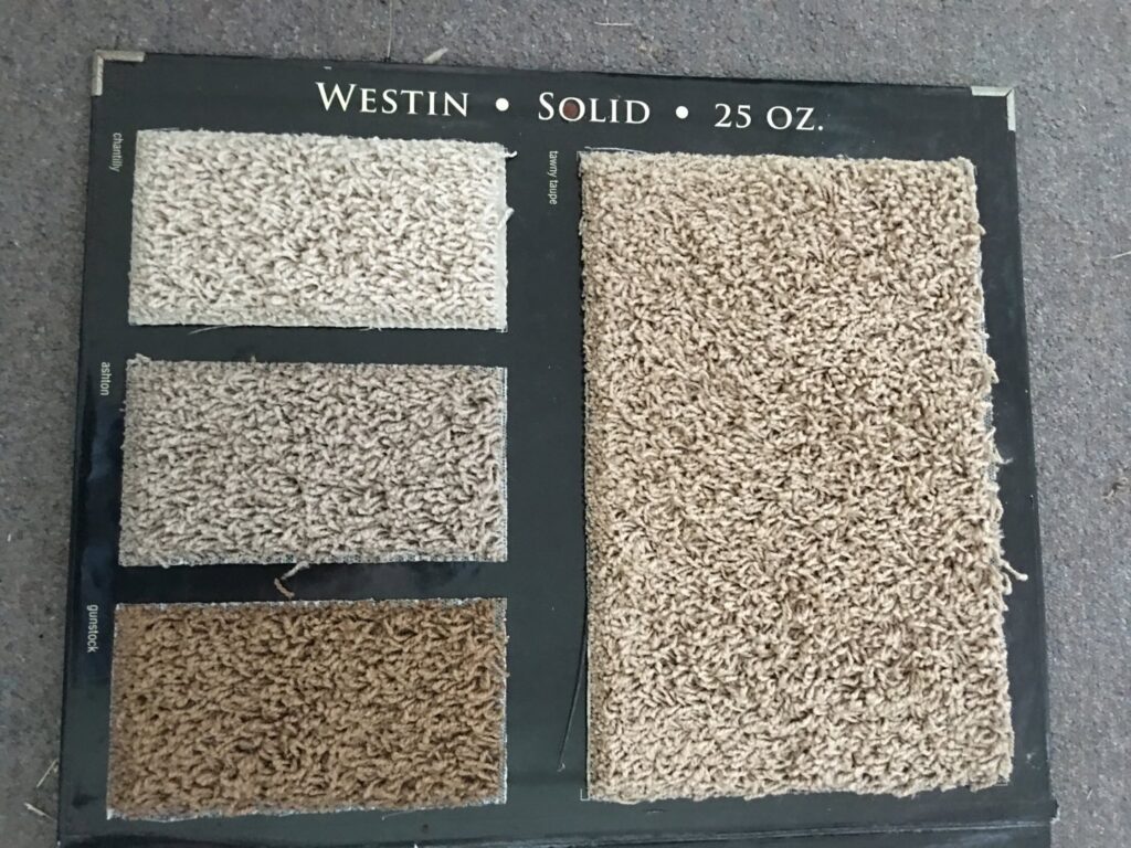 Various carpet samples displayed on a board for selection by City Carpet Cleaners 1 in Houston, TX