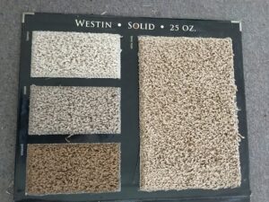 Various carpet samples displayed on a board for selection by City Carpet Cleaners 1 in Houston, TX