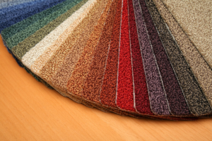 A fan of carpet samples in various colors and textures for selection at Big Orange Country Carpets & Concepts in Knoxville, TN.