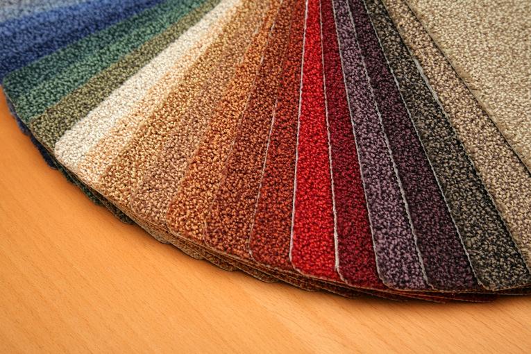 A fan of carpet samples in various colors and textures for selection at Big Orange Country Carpets & Concepts in Knoxville, TN.