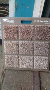 A display board featuring various carpet samples from Shaw Floors at Hayes Flooring and More in Clarksville, TN