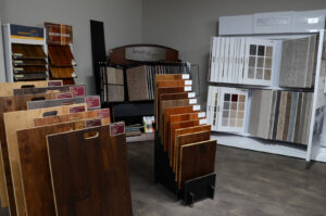 A showroom display featuring various carpet samples at BG Hardwood Direct in Bowling Green, KY