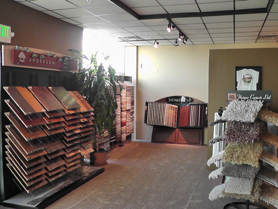 A showroom display of various carpet samples at Dallas Floor Designs in Reno, NV, showcasing options for carpet contractor services.