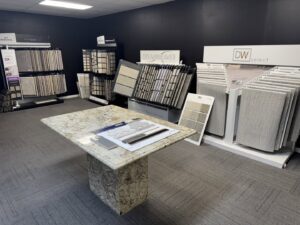 A showroom display of various carpet samples at Floor N More at Rockwall in Rockwall, TX