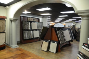A wide selection of carpet samples displayed in the showroom at Madison Flooring & Paint in Madison, AL