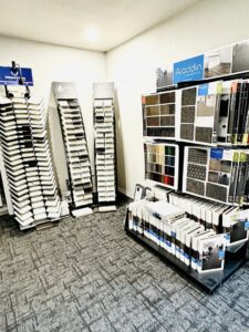 A showroom display featuring various carpet samples at Trendsetters Flooring in Benbrook, TX
