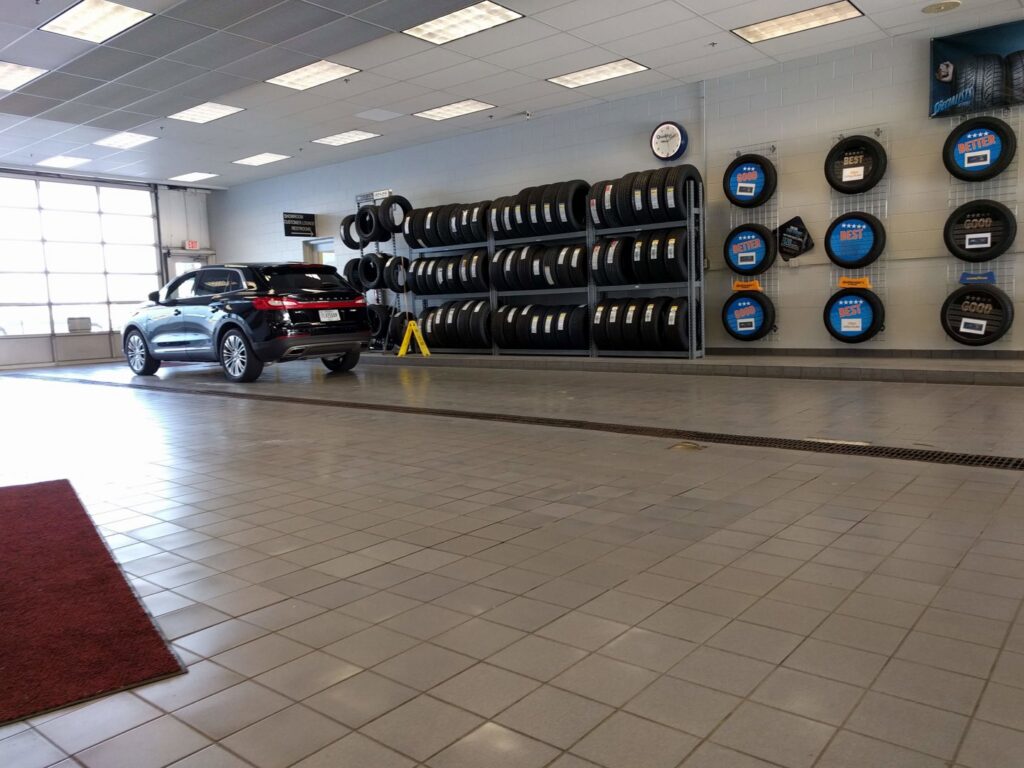 A carpet seam being repaired with a specialized tool by Ethan Fletcher, a carpet contractor in South Bend, IN.