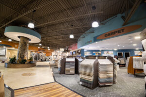 A wide selection of carpet samples displayed in the Custom Floors showroom in Fishers, IN