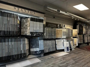 Interior view of the carpet showroom featuring Stanton and Antrim displays at Morency Flooring in New Bedford, MA.