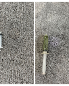 Before and after comparison of carpet spot treatment by Hughes Dry Professional Carpet Care in Marietta, GA, showing a syringe for application.