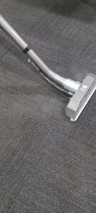 A close-up of a carpet steam cleaning in progress by Jake's Steamer the Carpet Cleaner in Seminole, TX