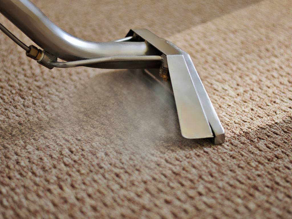 Professional carpet steam cleaning in progress by Unlimited Carpet & Grout Cleaning in Las Vegas, NV.