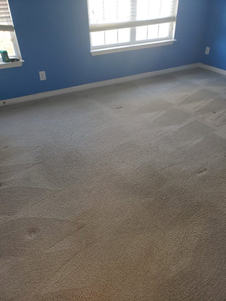 Close-up of a light-colored carpet texture, possibly before a deep cleaning service by Greensboro Carpet Cleaning - DeepClean in Greensboro, NC