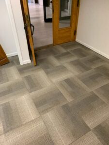 Newly installed carpet tiles in a commercial space by CAP Flooring in Buffalo, NY