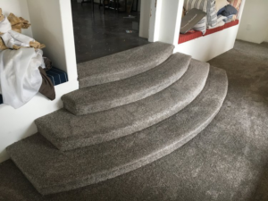 Newly installed carpet on curved stairs and floor by Alpine Floor Covering in Nampa, ID.