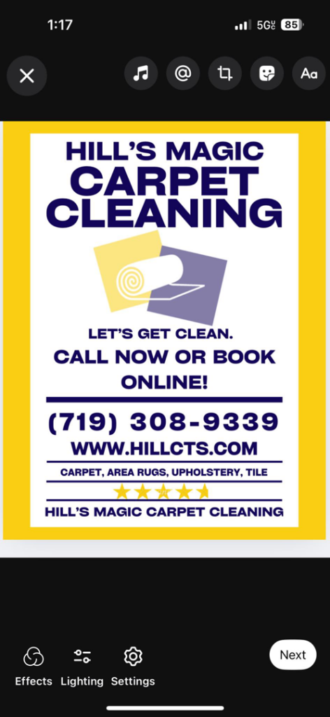 A carpeted living area with a cleaning hose visible, indicating a recent or ongoing carpet cleaning service by Hill's Magic Carpet Cleaning in Colorado Springs, CO.