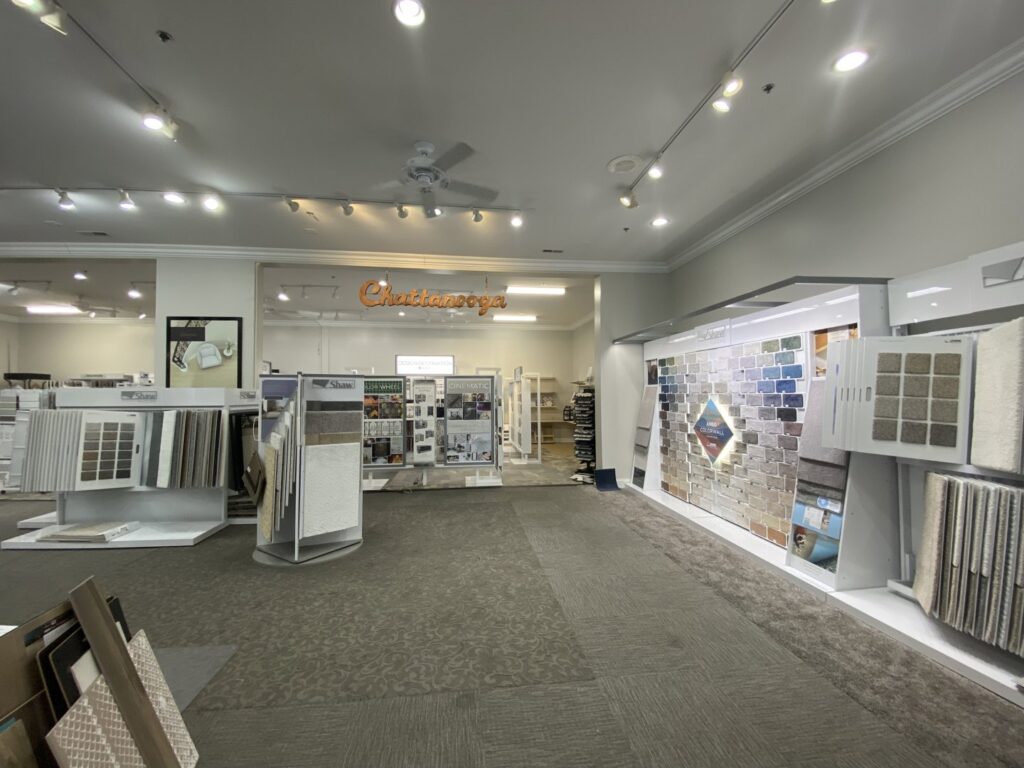 A wide view of the carpeted showroom floor at Chattanooga Flooring Center in Chattanooga, TN, showcasing various flooring options.