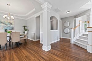 A beautifully carpeted staircase leading upstairs, showcasing a completed installation by Floors To Go in Virginia Beach, VA.