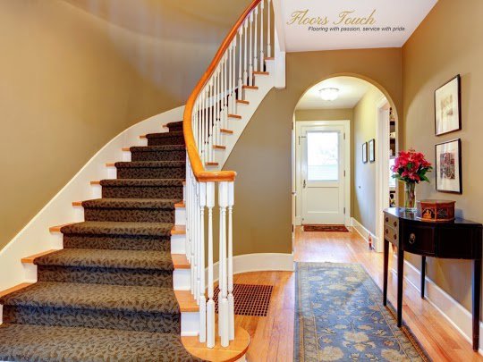 A beautifully installed carpeted staircase, showcasing quality work by Floors Touch in McKinney, TX.