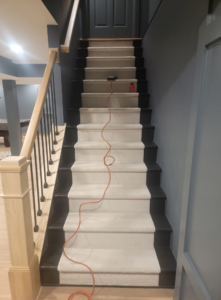 A newly carpeted staircase, showcasing professional carpet installation by Harper's Floor's in Columbus, OH.