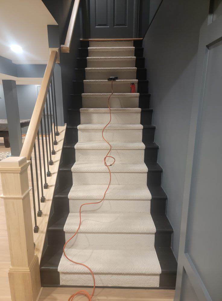 A newly carpeted staircase, showcasing professional carpet installation by Harper's Floor's in Columbus, OH.