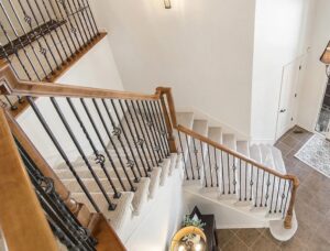 A beautifully carpeted staircase, a completed installation by Keystone Carpet & Tile in Omaha, NE.
