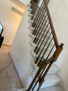 A beautifully carpeted staircase showcasing quality installation by Red carpet&home remodeling in Olney, MD.