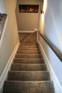 An overhead view of a carpeted staircase runner, expertly installed by Southwest Floors in Seven Hills, OH.