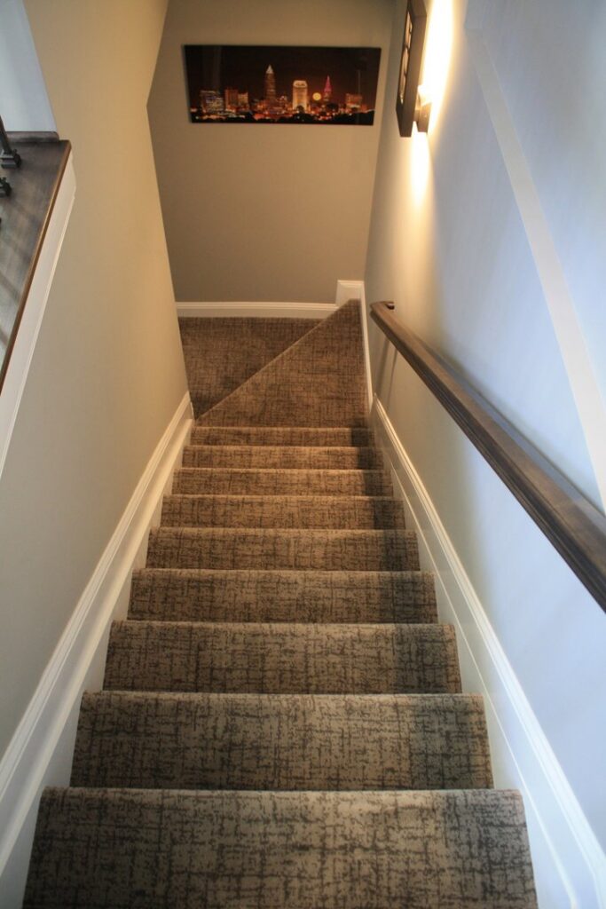 An overhead view of a carpeted staircase runner, expertly installed by Southwest Floors in Seven Hills, OH.